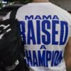 PLAYERA MAMA RAISED A CHAMPION.