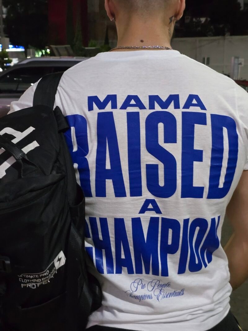 1000162488-scaled-1.jpg PLAYERA MAMA RAISED A CHAMPION.